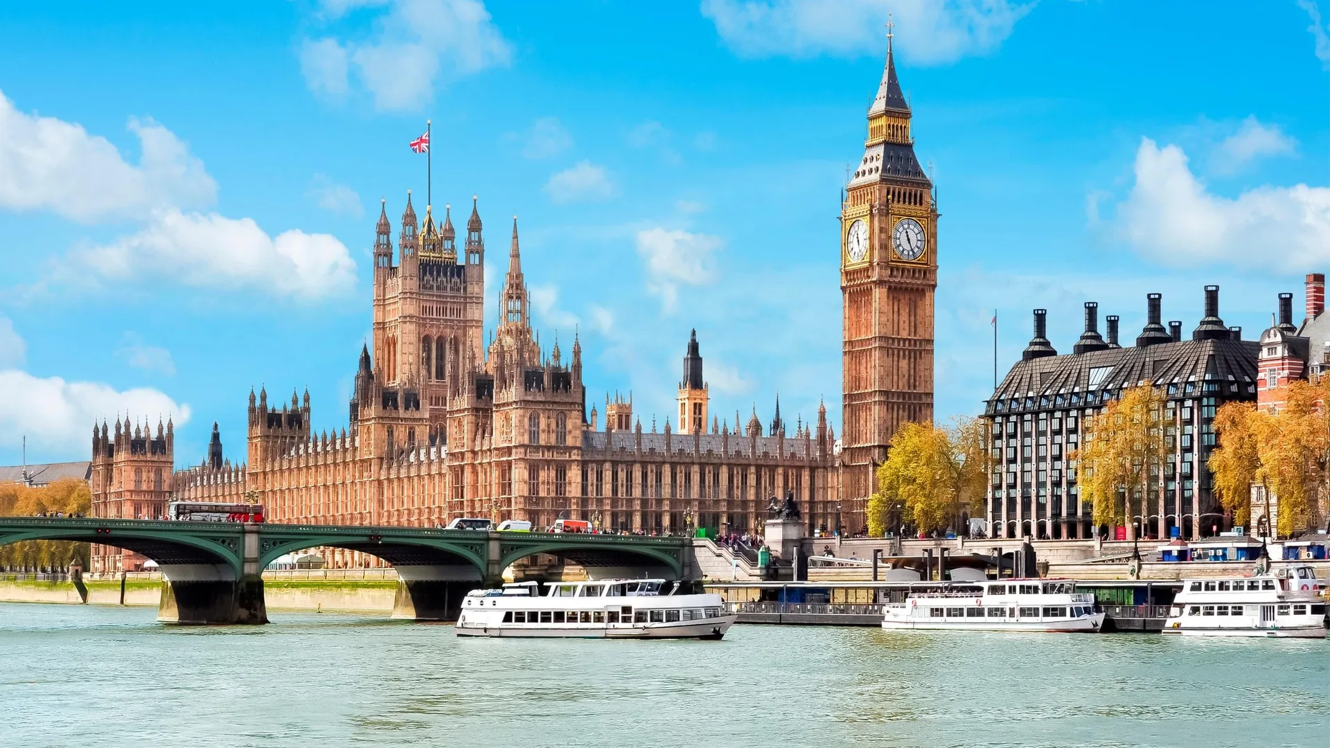 Sightseeing boats on the Thames by Westminster Bridge and the Houses of Parliament, from the Westminster to Greenwich cruise listing